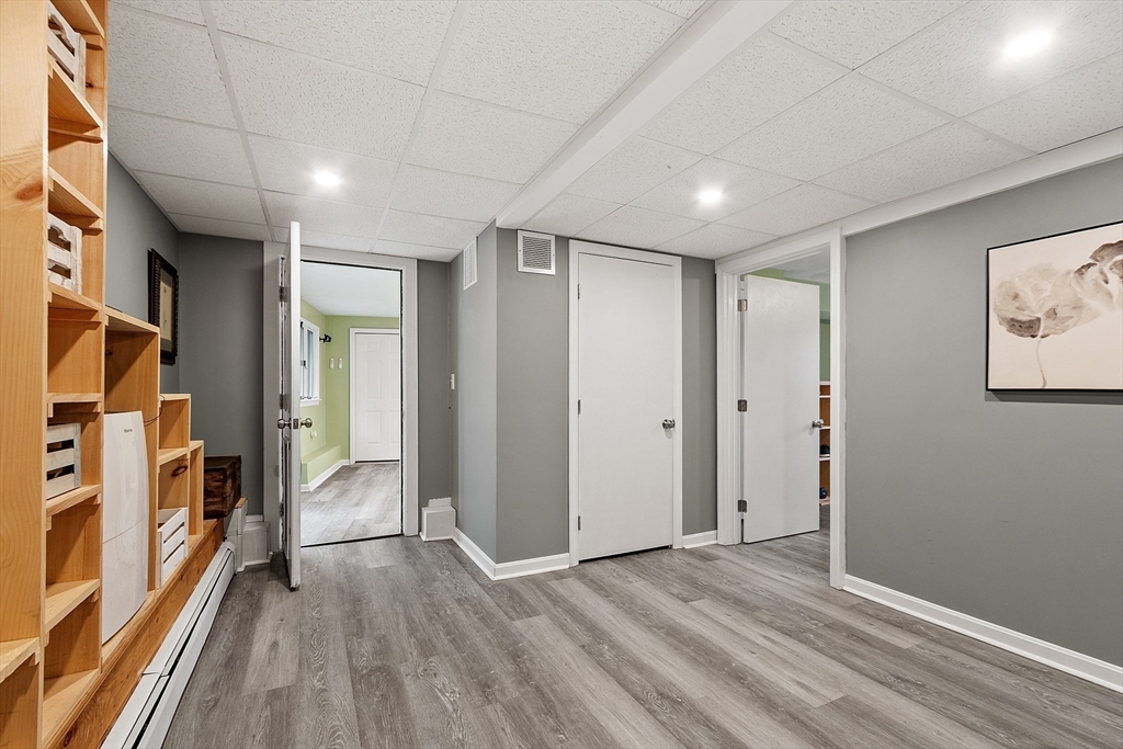 16 Michael Road Maynard, MA 01754 - Photo 19 of 39 wooden floor in an empty room with a window