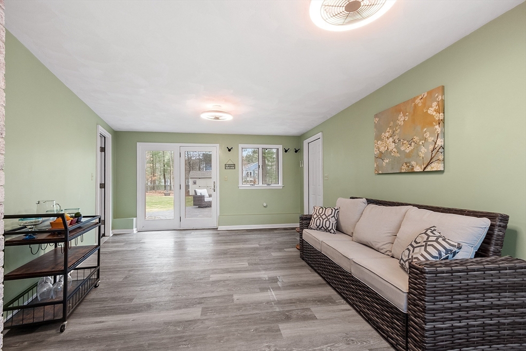 16 Michael Road Maynard, MA 01754 - Photo 26 of 39 a living room with furniture and wooden floor