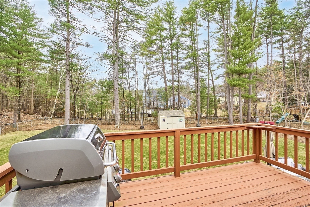 16 Michael Road Maynard, MA 01754 - Photo 33 of 39 a view of a wooden deck and outdoor space