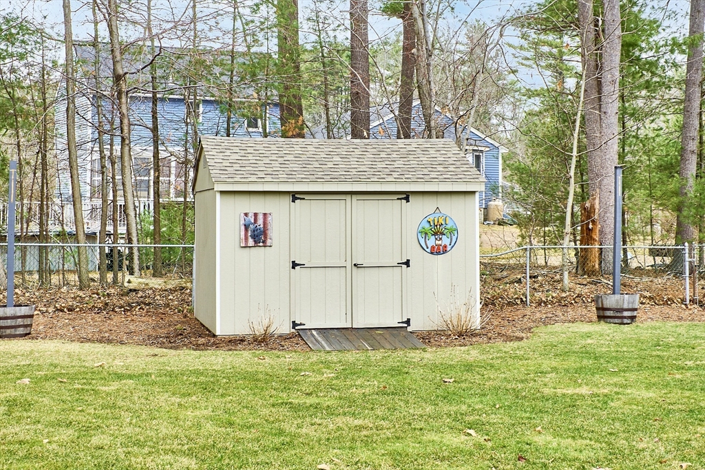 16 Michael Road Maynard, MA 01754 - Photo 34 of 39 a view of a house with backyard and a tree