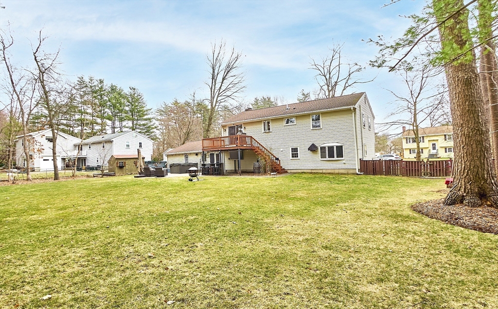 16 Michael Road Maynard, MA 01754 - Photo 37 of 39 a view of a house with a yard and sitting area