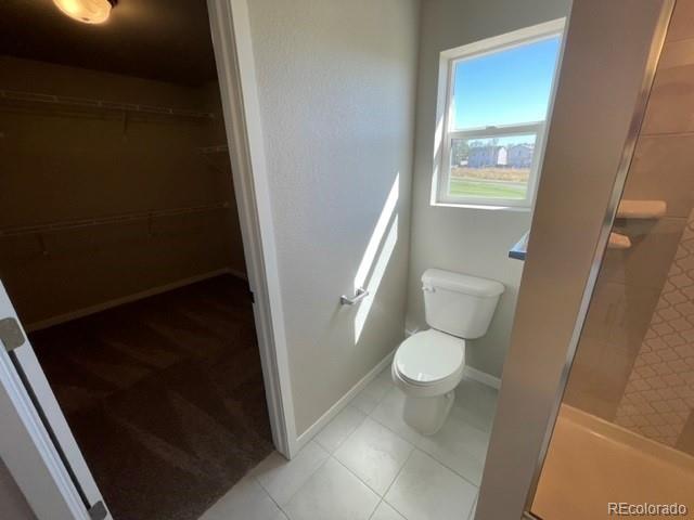 534 Ryan Avenue Fort Lupton, CO 80621 - Photo 15 of 25 a bathroom with a toilet
