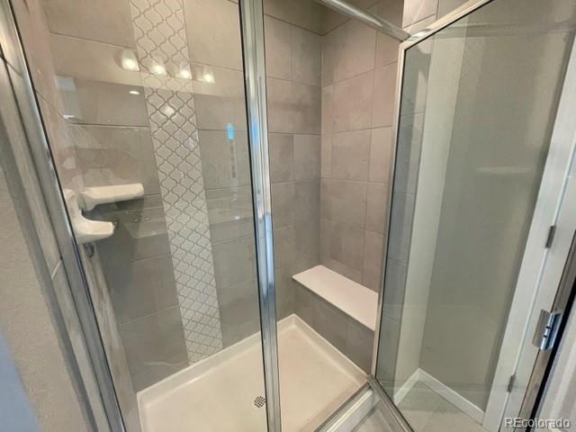 534 Ryan Avenue Fort Lupton, CO 80621 - Photo 18 of 25 a bathroom with a shower