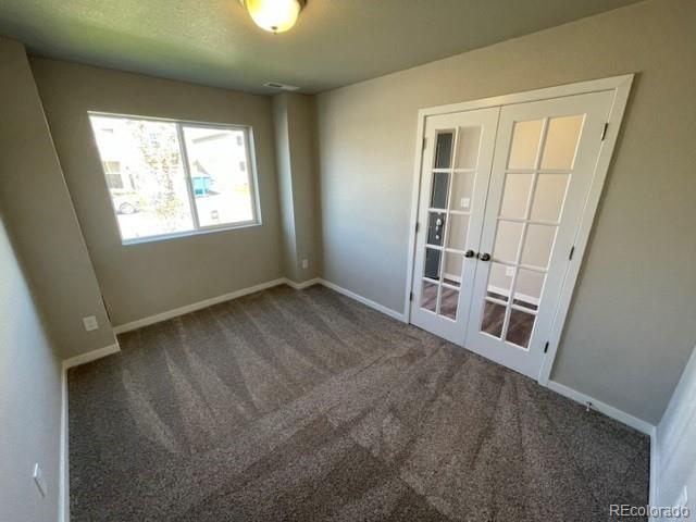 534 Ryan Avenue Fort Lupton, CO 80621 - Photo 8 of 25 a view of an empty room with a window