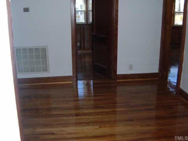 5805 Waycross Street Raleigh, NC 27606 - Photo 4 of 6 a view of wooden floor