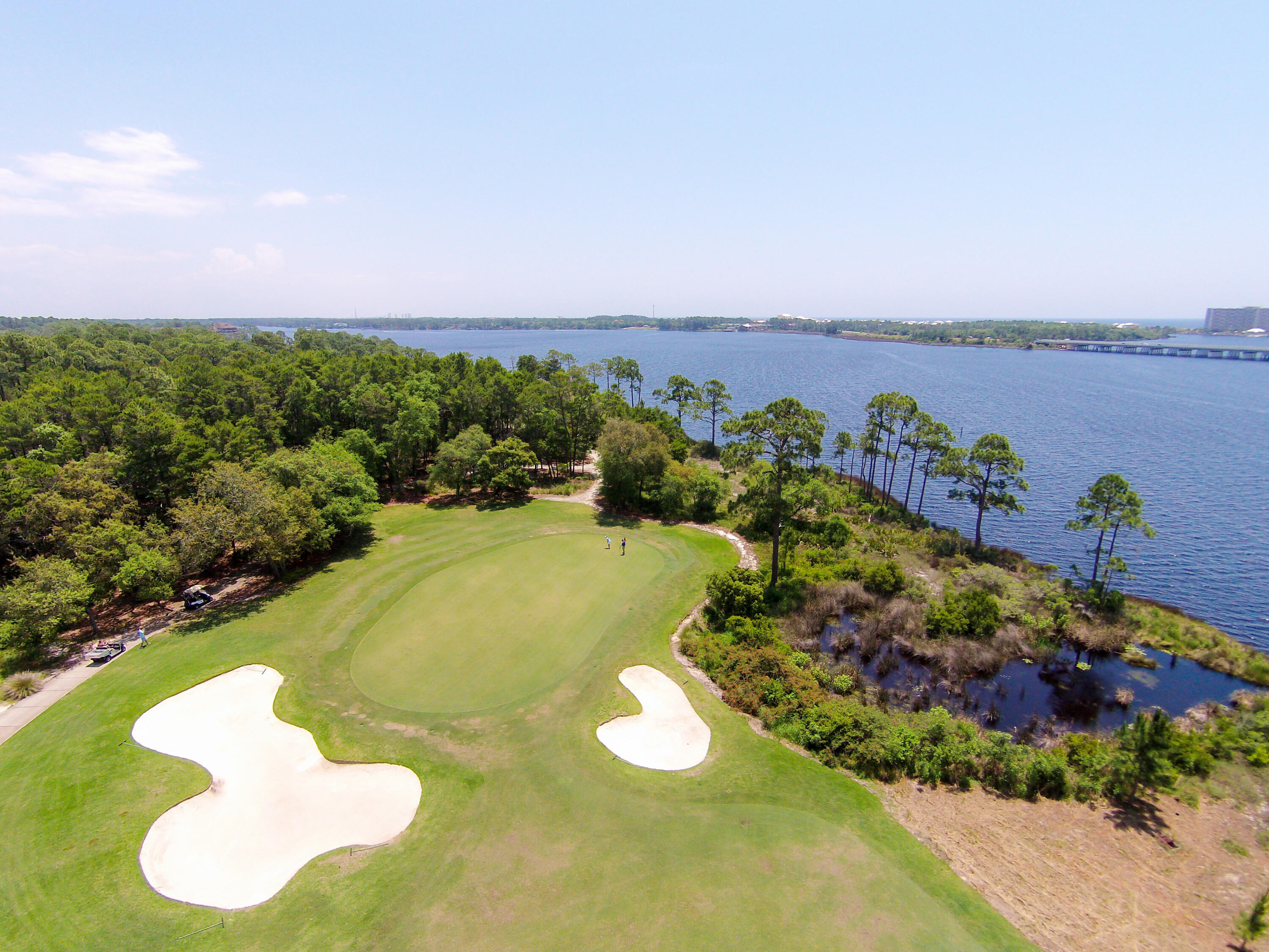 22114 Marsh Rabbit Run Panama City Beach, FL 32413 - Photo 13 of 16 a view of a lake with outdoor space