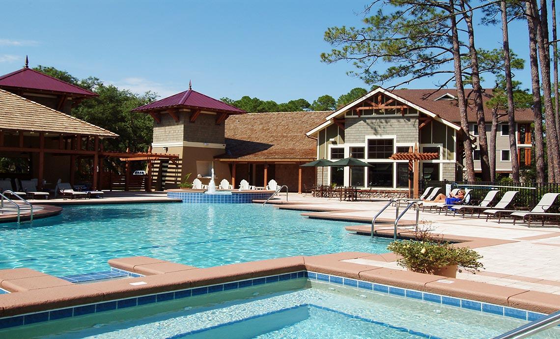 22114 Marsh Rabbit Run Panama City Beach, FL 32413 - Photo 15 of 16 a view of a house with backyard and sitting area