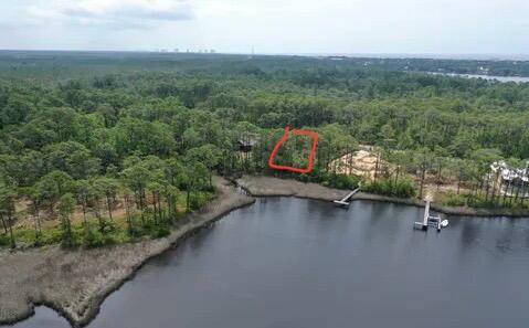 22114 Marsh Rabbit Run Panama City Beach, FL 32413 - Photo 7 of 16 a view of a lake with a mountain