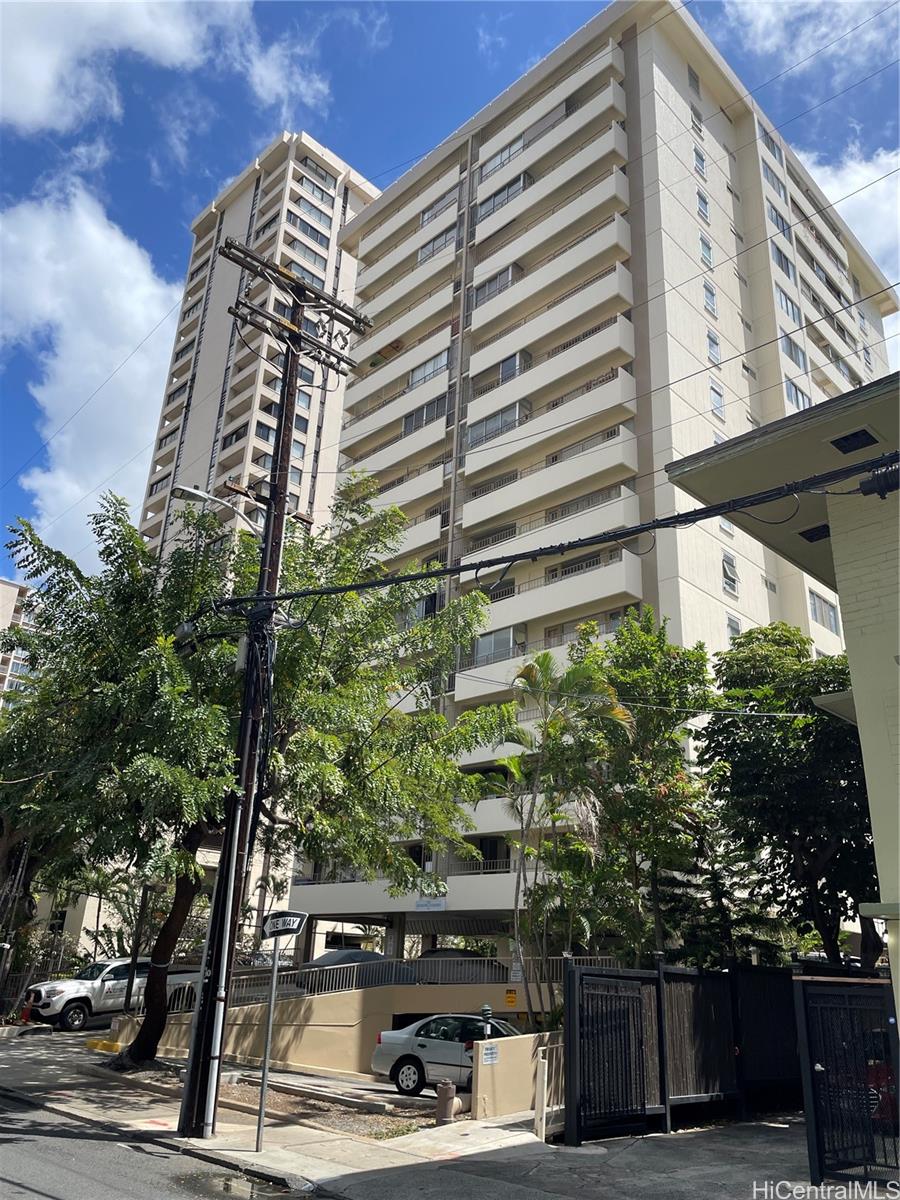 225 Kaʻiulani Avenue, Unit 402 Honolulu, HI 96815 - Photo 15 of 16 a front view of a building