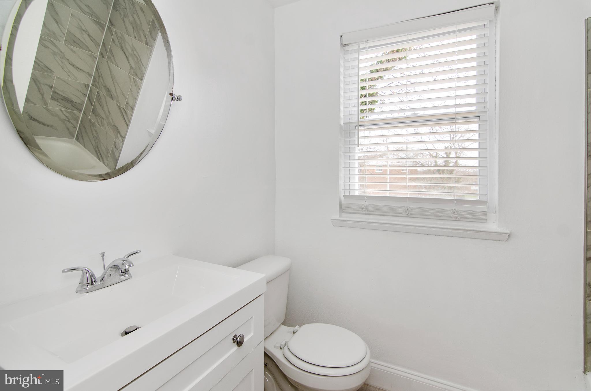 612 Markham Road Baltimore, MD 21229 - Photo 12 of 17 Newly Updated Bathroom