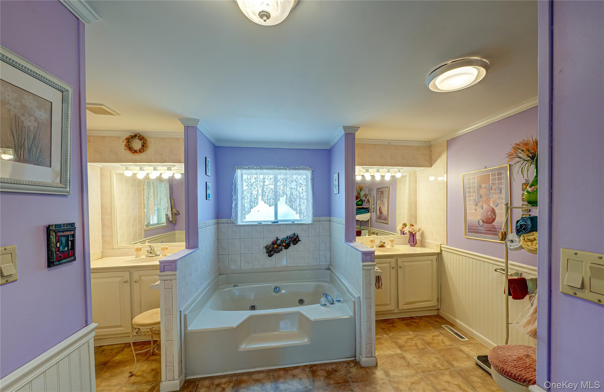 1407 Middle Road, Unit 6 Calverton, NY 11933 - Photo 17 of 25 a large bathroom with a tub sink and mirror