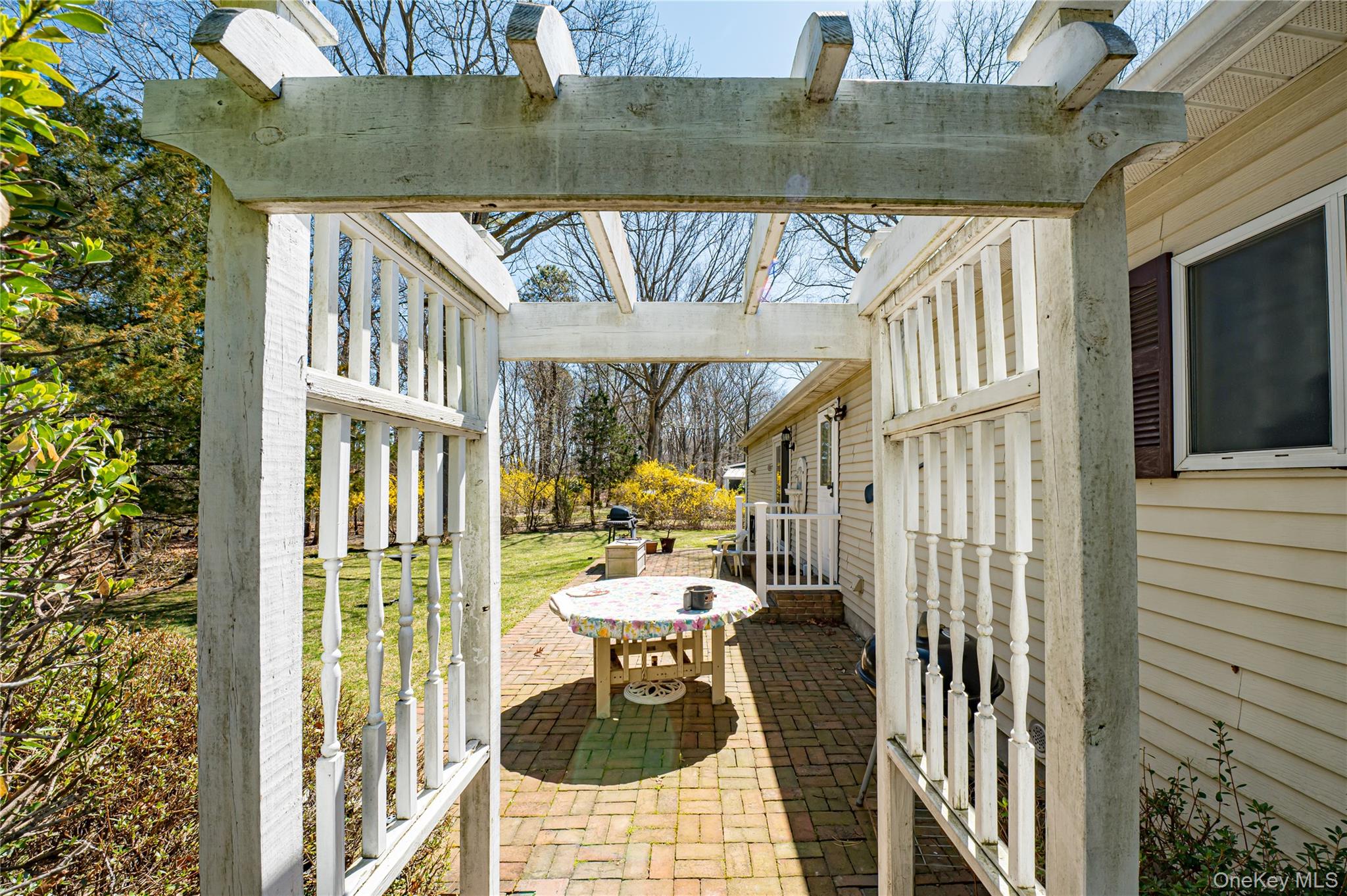 1407 Middle Road, Unit 6 Calverton, NY 11933 - Photo 22 of 25 a view of balcony and patio