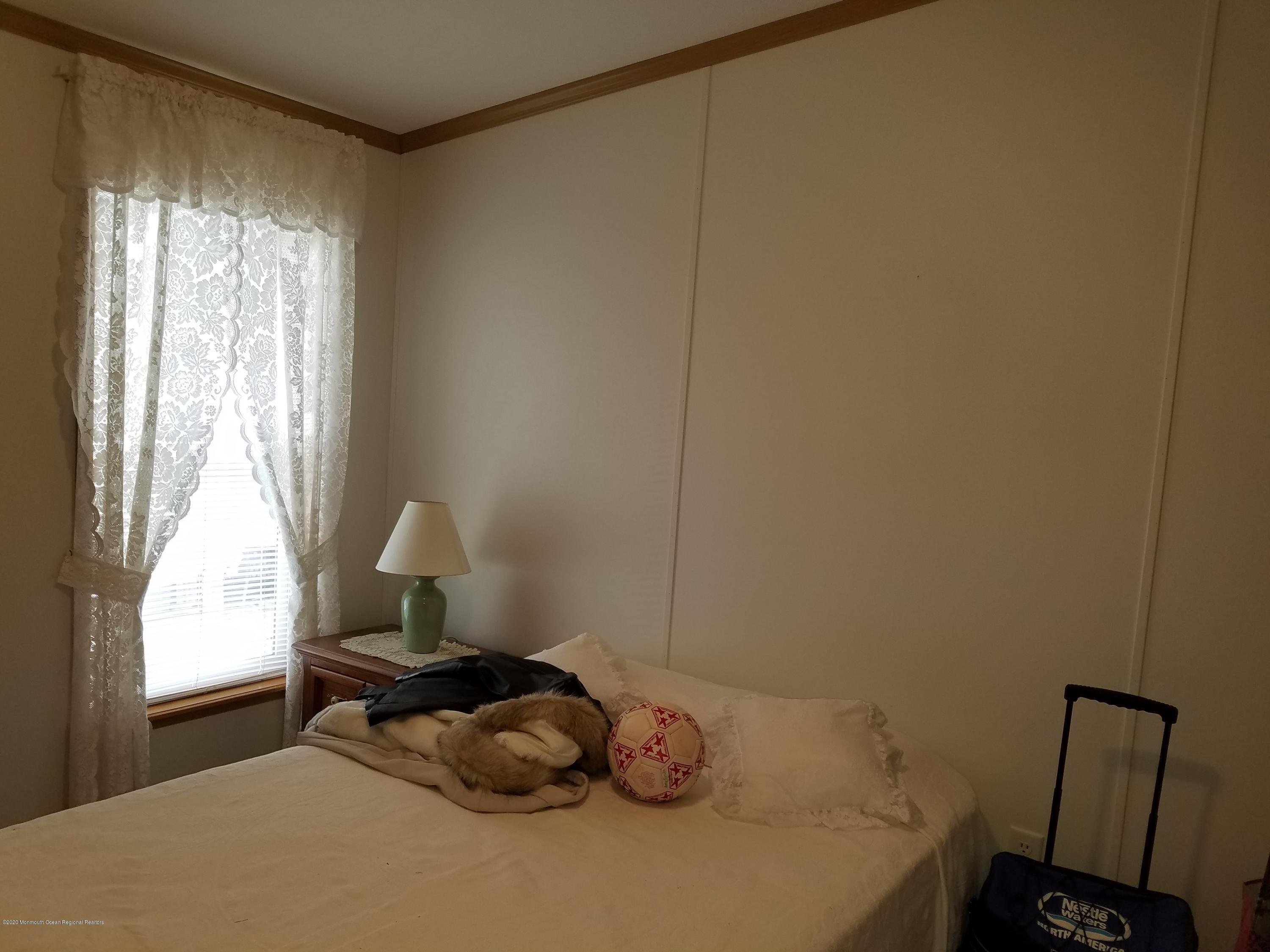 74 Pine Ridge Boulevard Whiting, NJ 08759 - Photo 14 of 28 a room with a window