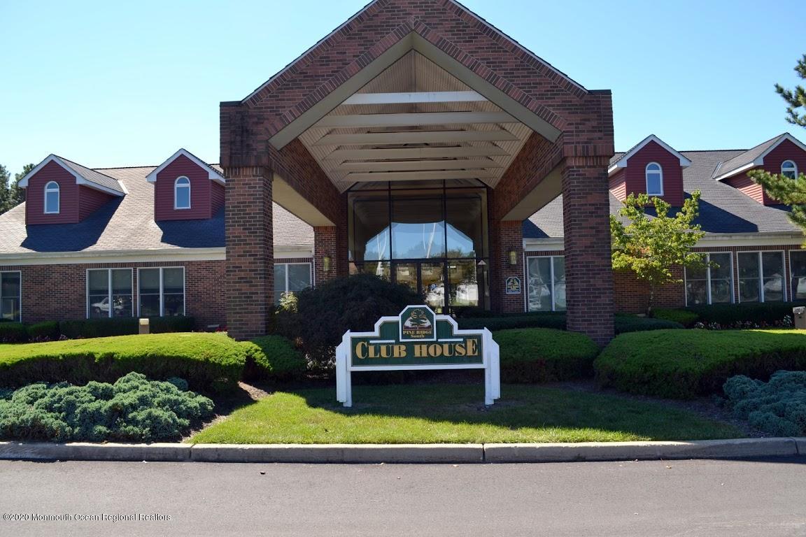 74 Pine Ridge Boulevard Whiting, NJ 08759 - Photo 19 of 28 a front view of a house with garden