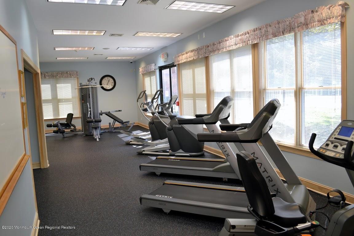 74 Pine Ridge Boulevard Whiting, NJ 08759 - Photo 28 of 28 a view of a room with gym equipment
