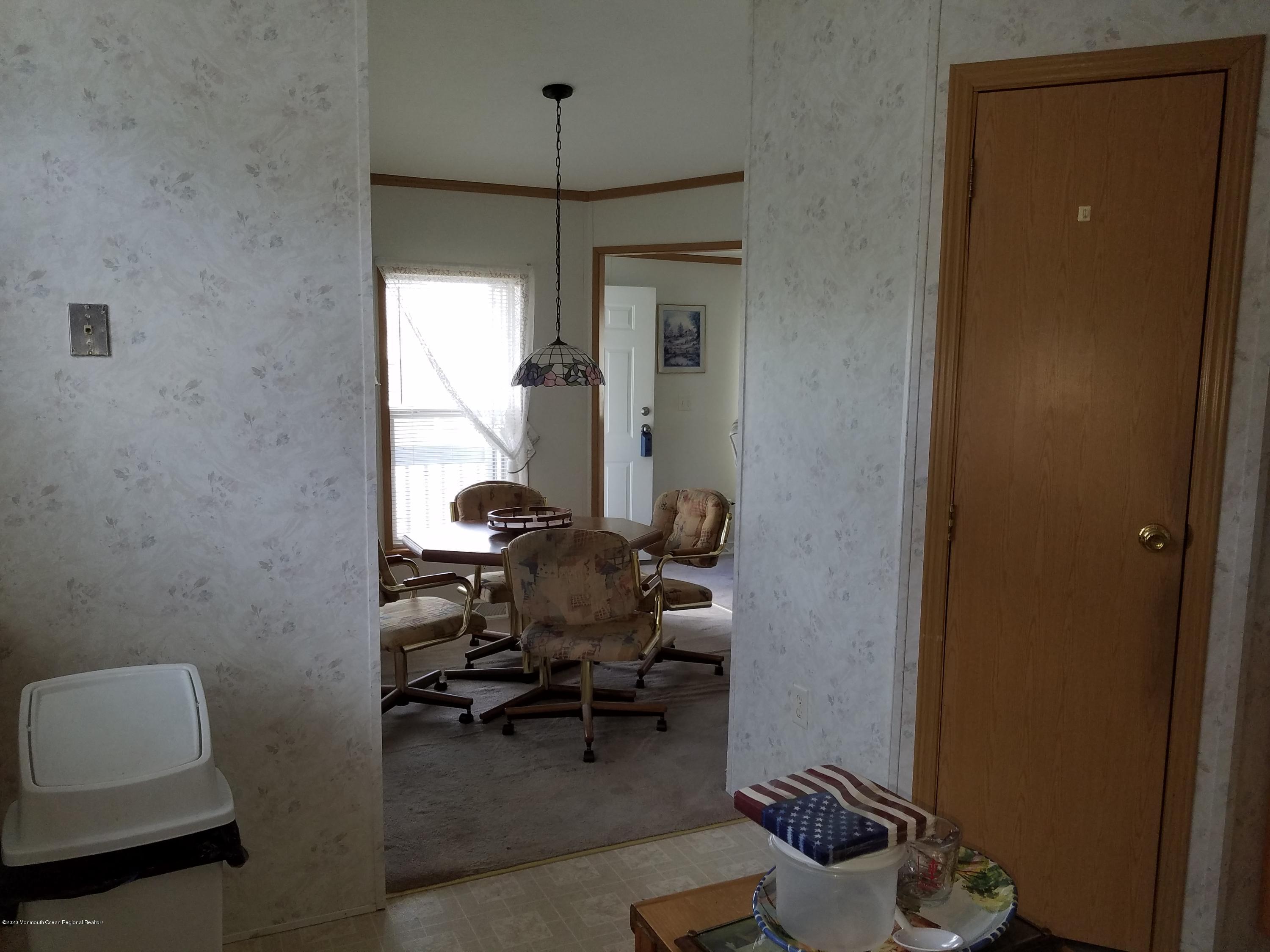 74 Pine Ridge Boulevard Whiting, NJ 08759 - Photo 7 of 28 a room with furniture and a window