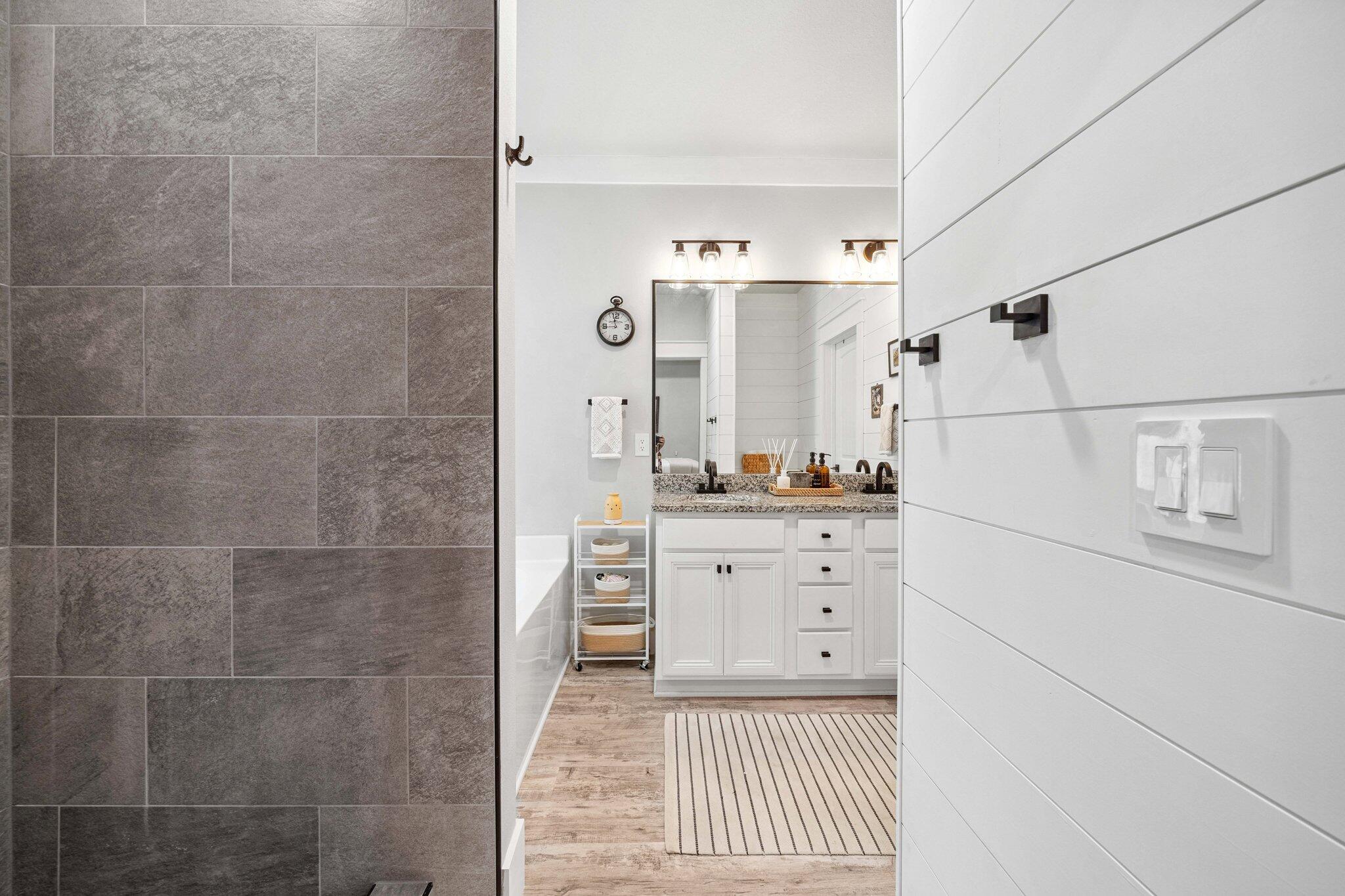 199 Southern Pnes Road Santa Rosa Beach, FL 32459 - Photo 21 of 44 a bathroom with a shower sink and mirror