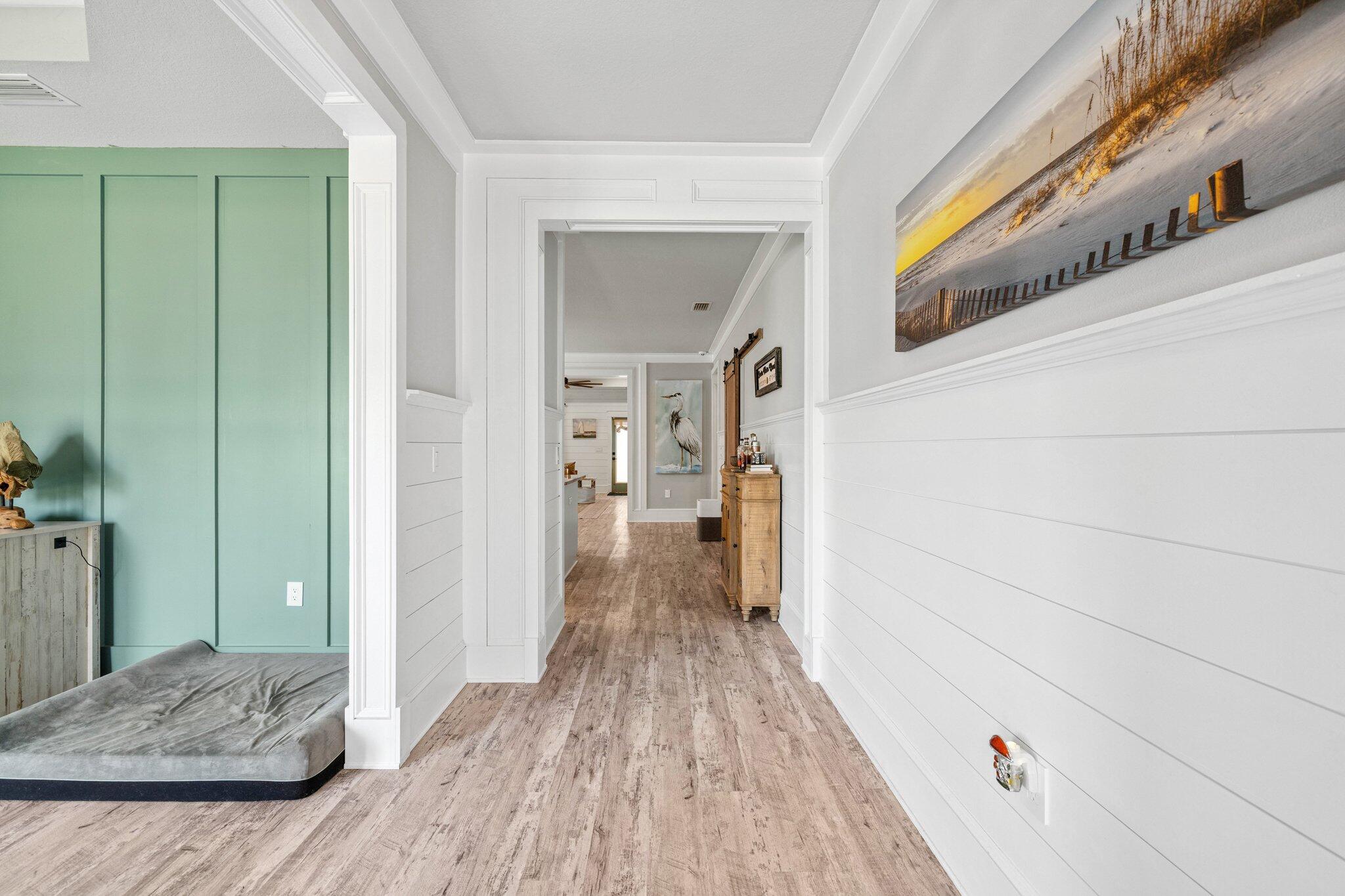 199 Southern Pnes Road Santa Rosa Beach, FL 32459 - Photo 5 of 44 a view of hallway with wooden floor