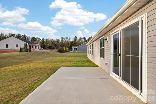 a house view with a garden space