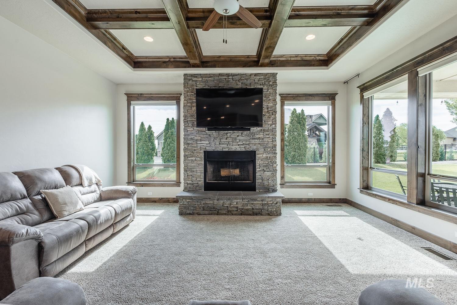 8077 Star Pass Ridge Road Nampa, ID 83686 - Photo 10 of 37 In-ground swimming pool with integrated steps, paver patio, covered patio, stone-clad outdoor bar, and an additional detached structure