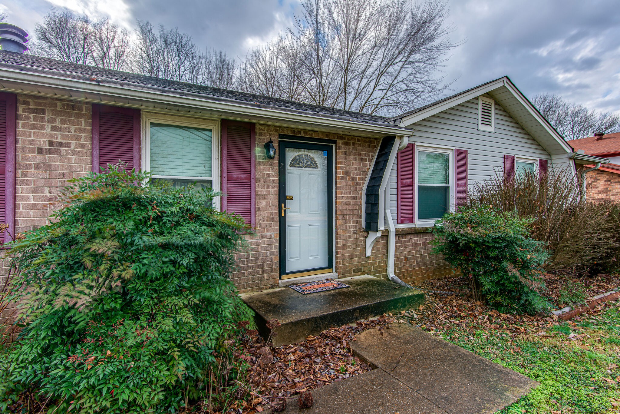 3309 Country Way Road Antioch, TN 37013 - Photo 3 of 26 a front view of a house with garden