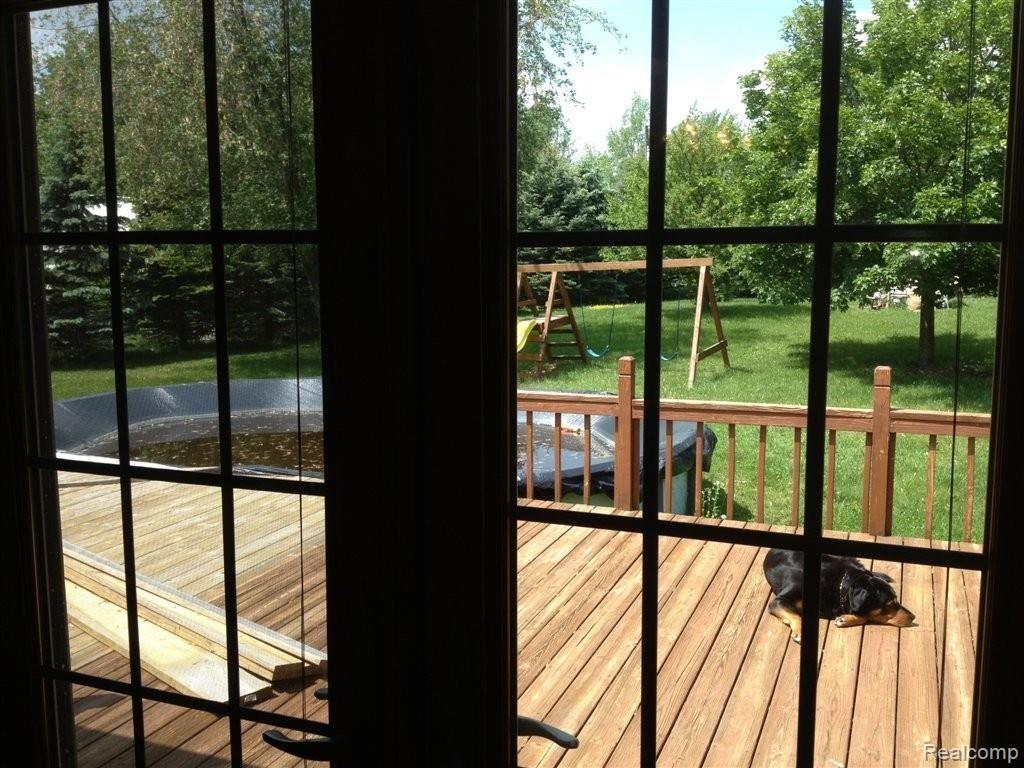 4954 Pinckney Road Howell, MI 48843 - Photo 13 of 20 Back Deck.JPG