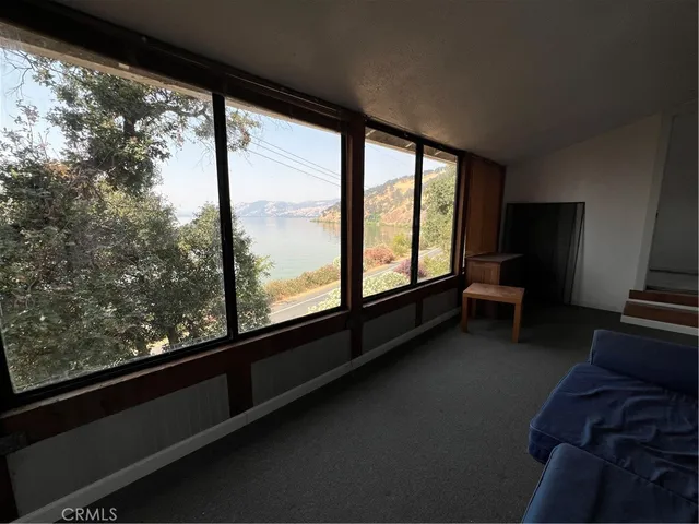 a view of a room with a large window