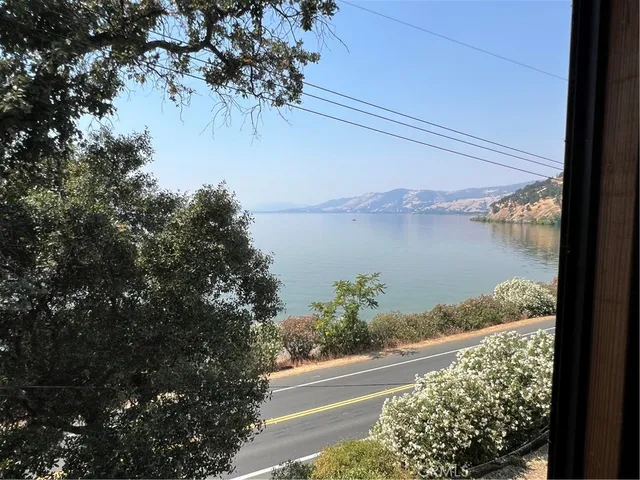 a view of a lake from a balcony