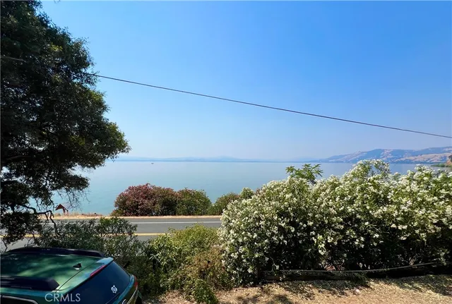 a view of balcony with wooden fence