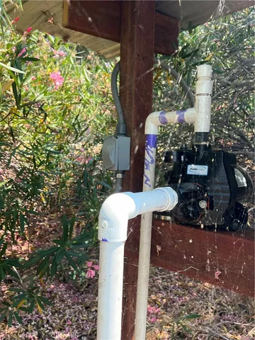 a sign that is on a bunch of flowers