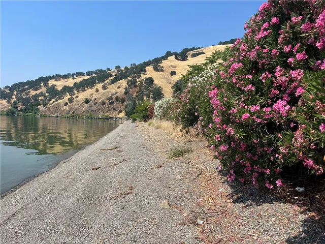 a view of a lake with a mountain in the background