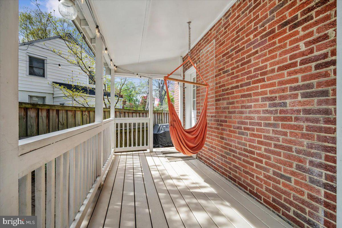 505 East Schuyler Road Silver Spring, MD 20901 - Photo 17 of 46 Covered back deck off the kitchen