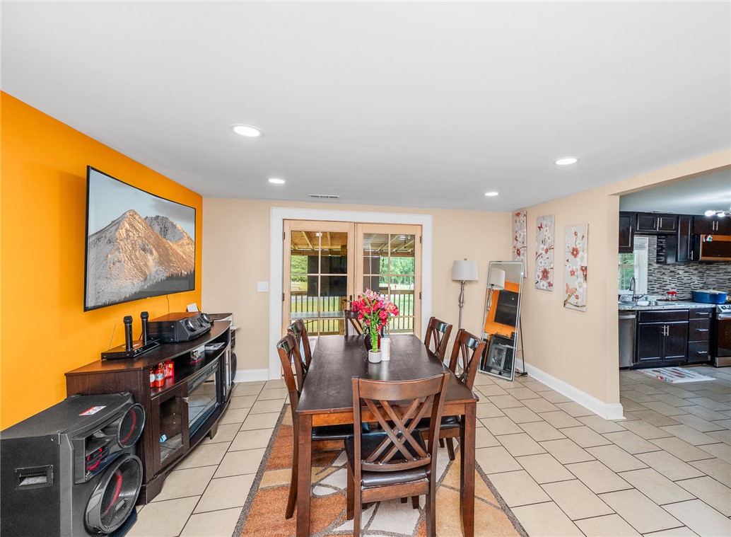 358 Finley Road Easley, SC 29642 - Photo 6 of 20 This inviting dining area seamlessly connects to the outdoors, perfect for gatherings.