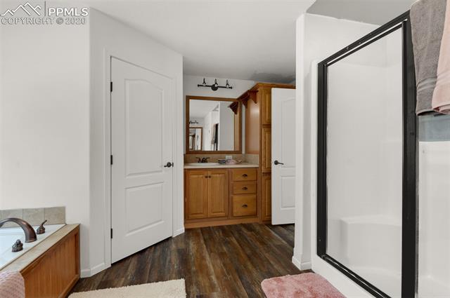 22750 Handle Road Calhan, CO 80808 - Photo 20 of 34 Another view of the mater with new paint and floors.