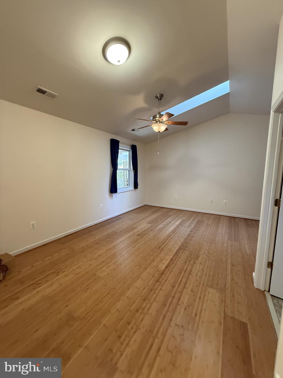 130 Springwood Drive, Unit RENTAL Fredericksburg, VA 22401 - Photo 13 of 22 Bedroom 2 - Tall ceilings and skylight