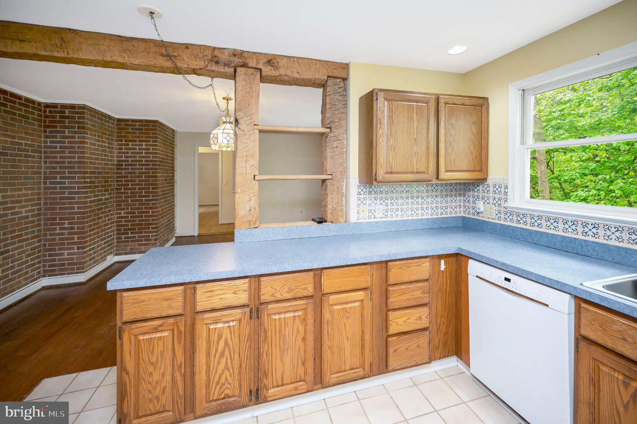 130 Springwood Drive, Unit RENTAL Fredericksburg, VA 22401 - Photo 19 of 39 Charming kitchen with rustic accents.