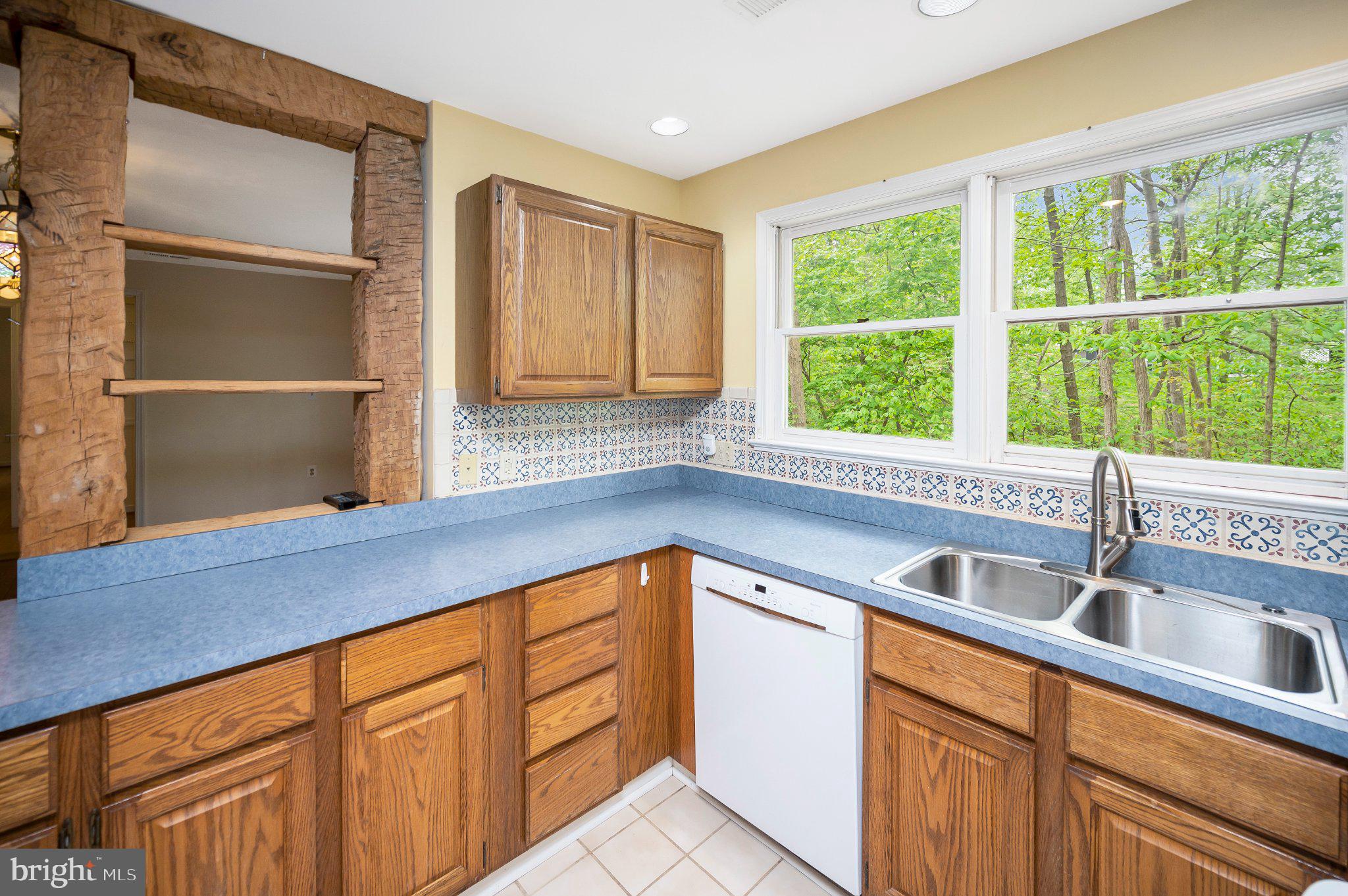 130 Springwood Drive, Unit RENTAL Fredericksburg, VA 22401 - Photo 20 of 39 Bright kitchen with nature views.