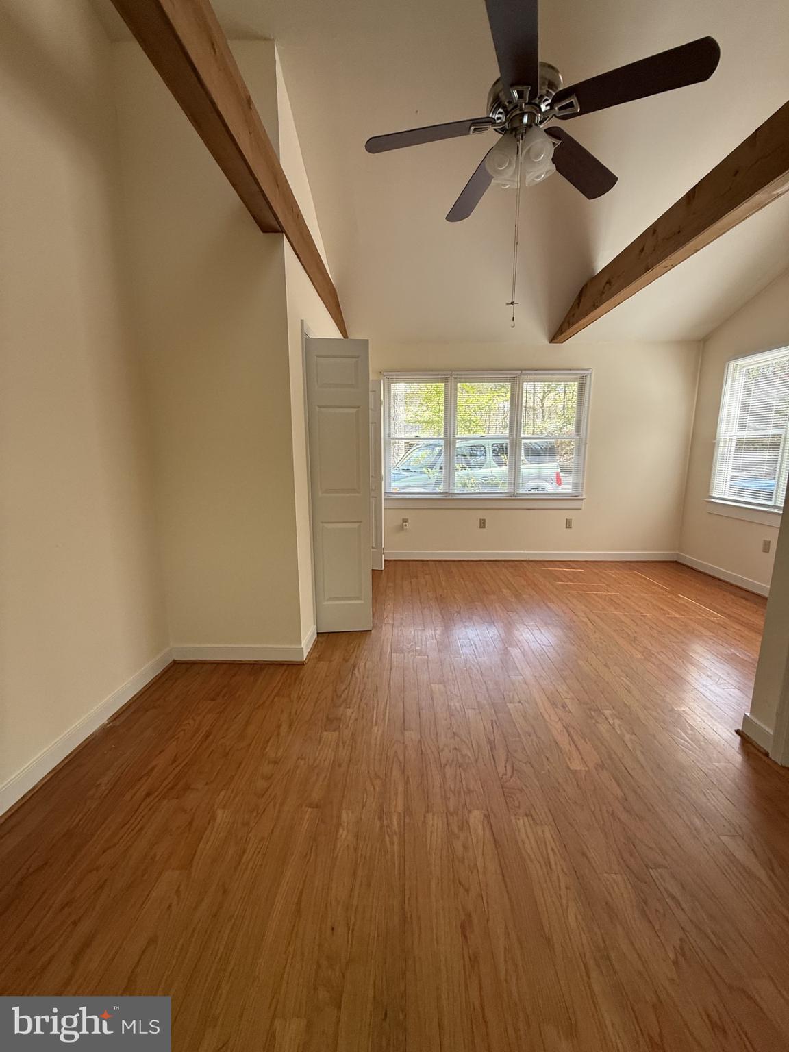 130 Springwood Drive, Unit RENTAL Fredericksburg, VA 22401 - Photo 2 of 22 Bedroom 1 - tall ceilings - rustic beams