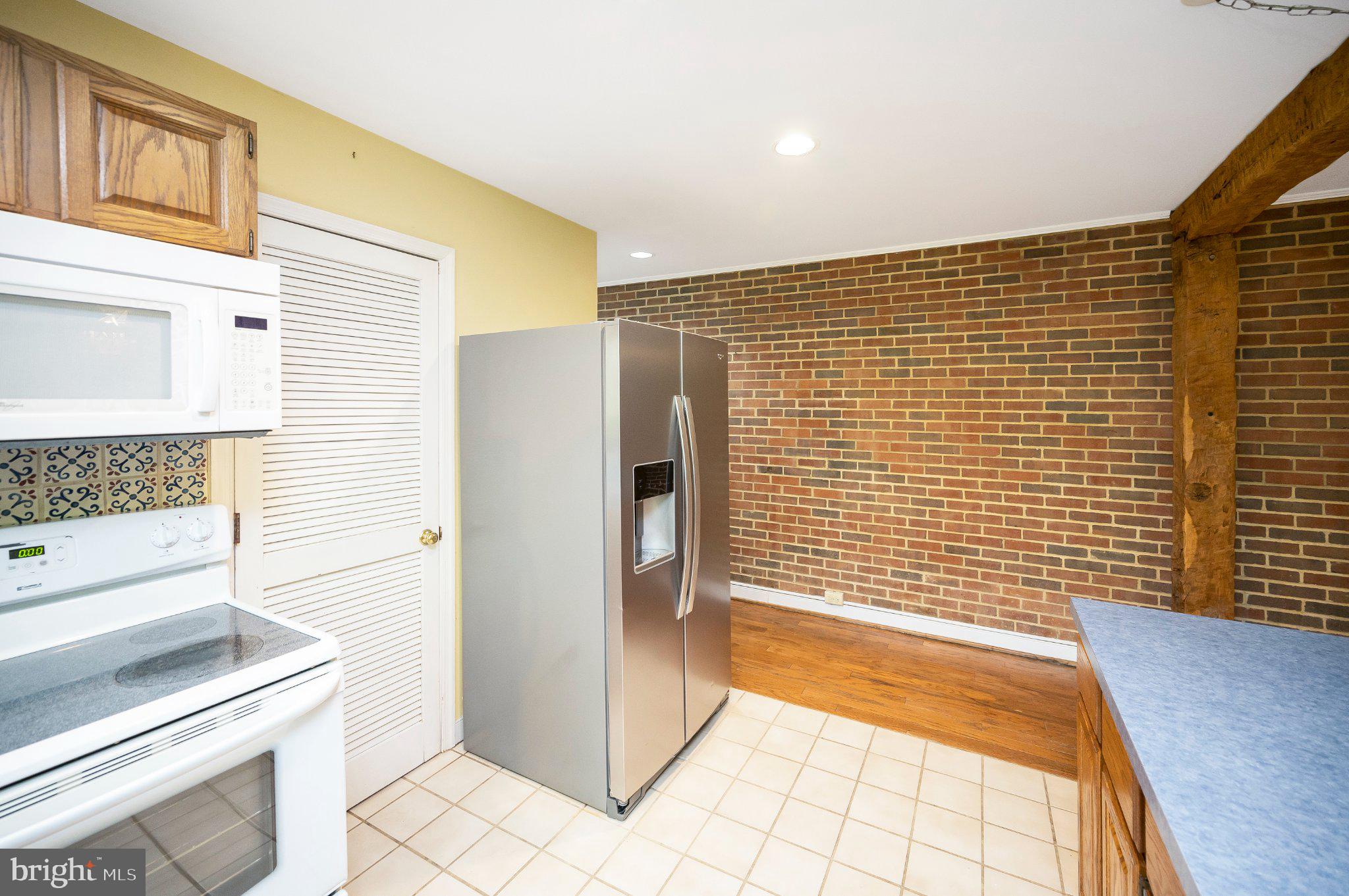 130 Springwood Drive, Unit RENTAL Fredericksburg, VA 22401 - Photo 21 of 39 Modern kitchen with rustic charm.