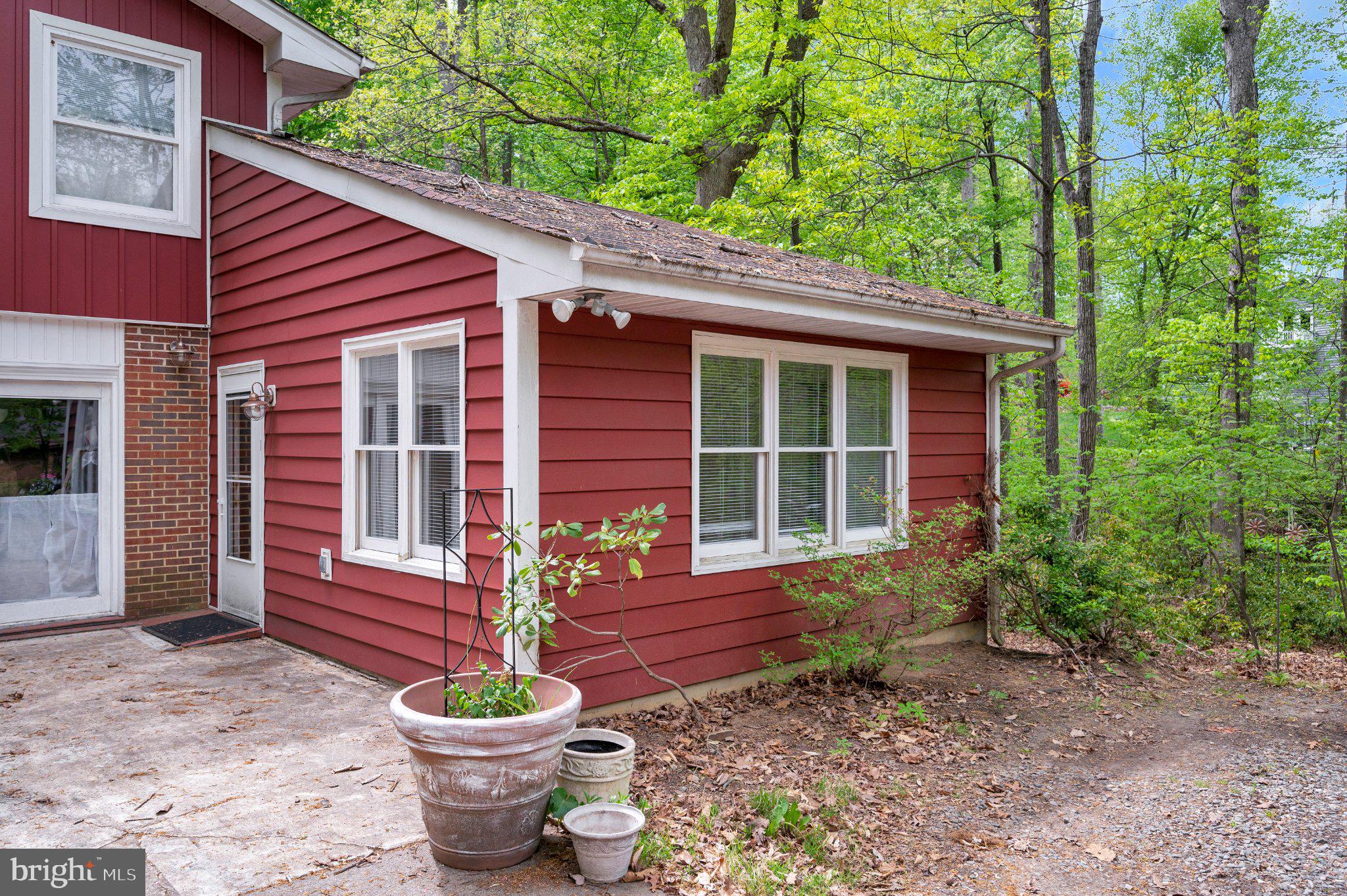 130 Springwood Drive, Unit RENTAL Fredericksburg, VA 22401 - Photo 3 of 39 Charming red cottage nestled in nature.
