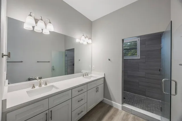 a bathroom with a bathtub and shower