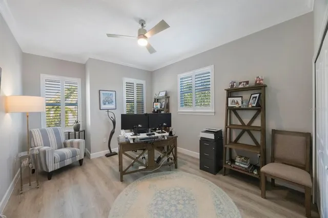 a kitchen with stainless steel appliances sink a refrigerator and cabinets
