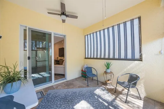 a view of a porch with a backyard