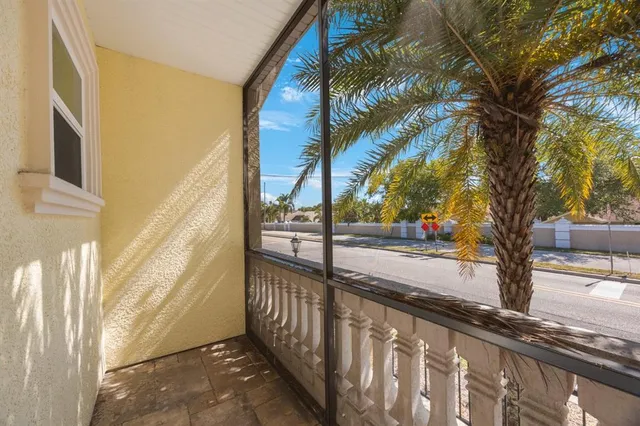 a view of a swimming pool with a yard