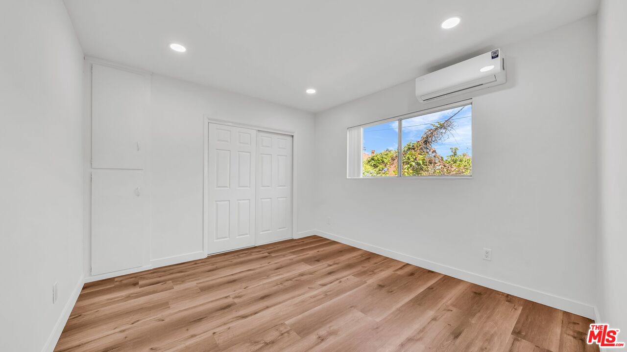 510 Pacific Avenue, Unit 6 Venice, CA 90291 - Photo 7 of 14 a view of empty room with wooden floor