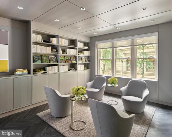 a living room with furniture and window