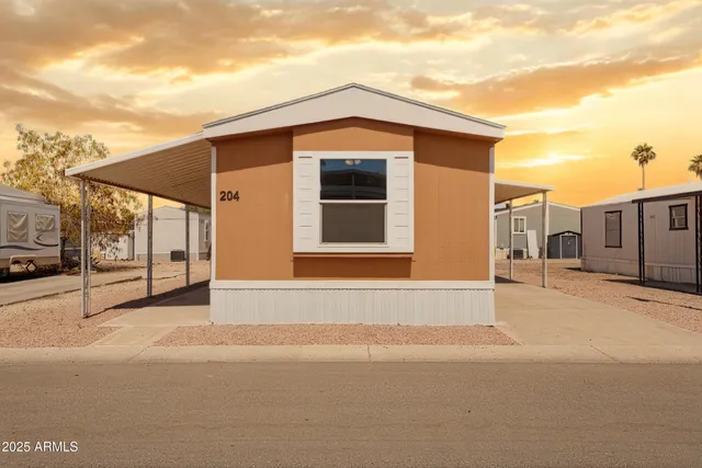 a view of a house with a street