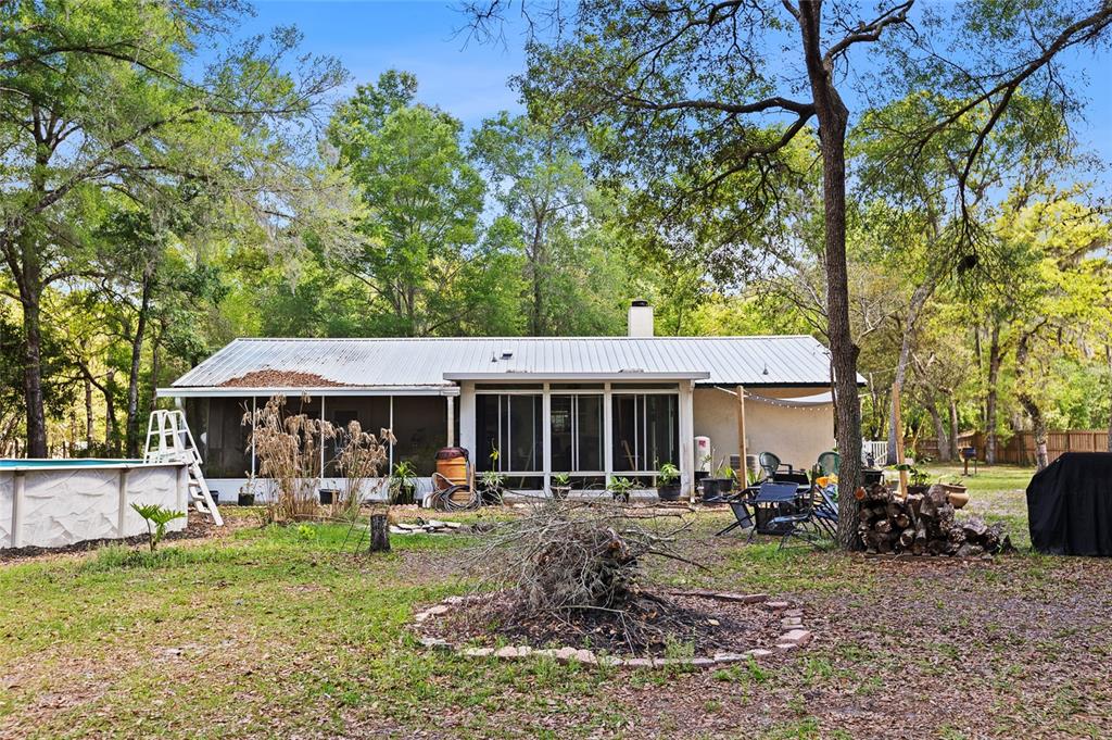 5420 East Gwendolyn Path Inverness, FL 34452 - Photo 34 of 42 a front view of a house with garden