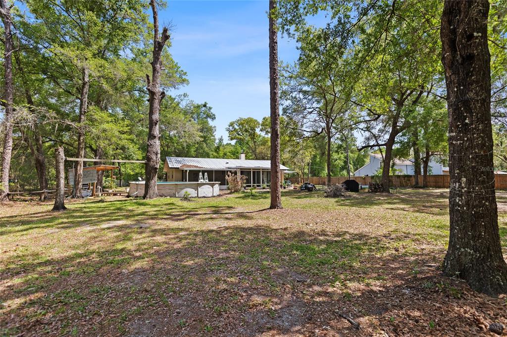 5420 East Gwendolyn Path Inverness, FL 34452 - Photo 36 of 42 a view of a house with yard and sitting area