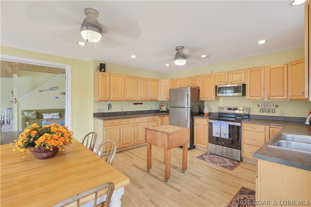 29966 Oak Knoll Road Rocky Mount, MO 65072 - Photo 15 of 59 Kitchen features light oak or hickory shaker-style